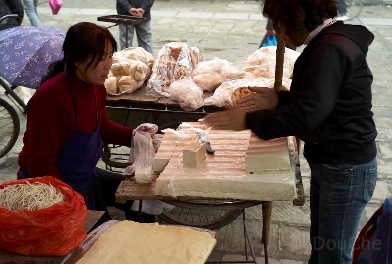 L1003266.jpg - Selling toufu (beancurd).