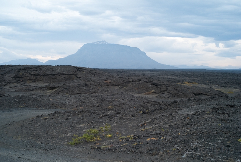 L1007609.jpg - Crossing lava streams ... spot the road?