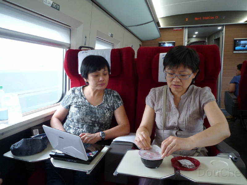 P1110987.jpg - On the really fast train ...